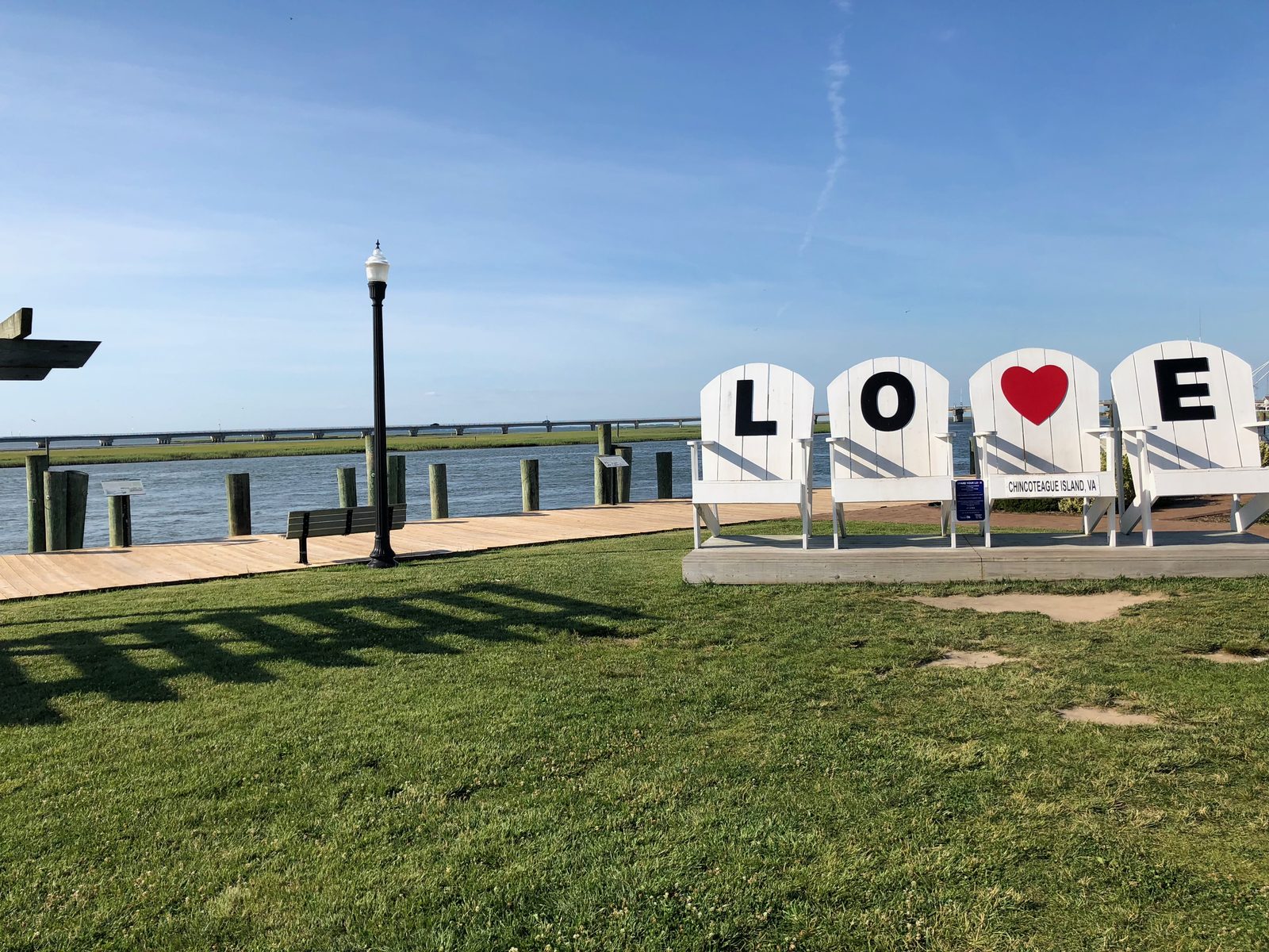 The LOVE chairs sign on the Chincoteague Island waterfront